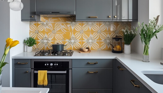 element home solutions modern kitchen with grey cabinets white countertops a yellow floral backsplash