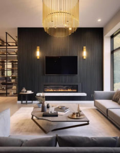 element home solutions stylish living room with bold black walls and refined gold accents